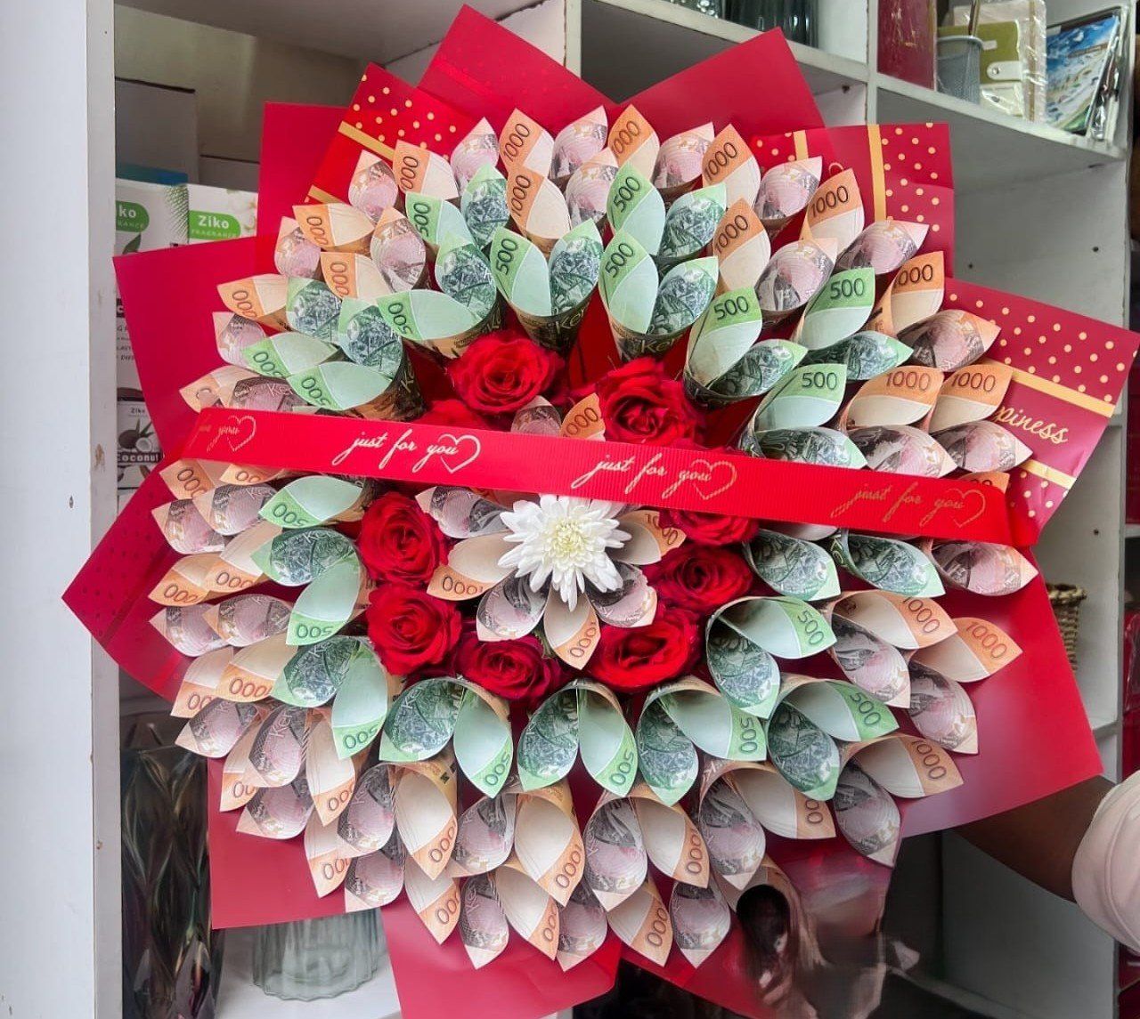 Clients cancel orders, florists devise new strategies following Central Bank's directive on money bouquets