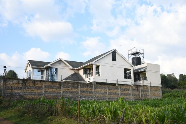 Police impound over 990 litres of ethanol, rounds of ammunition from mansion in Kiamunyi